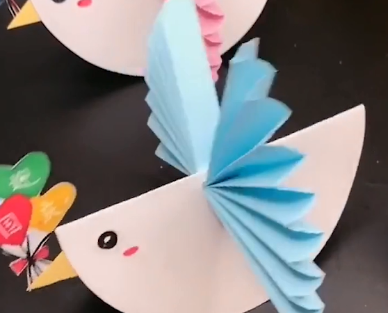 How do you make a simple origami chicken?